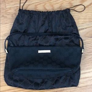 Authentic Gucci black clutch with strap